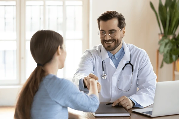 Illinois Medical Billing 8 smiling male gp shake hand 600nw 1873476157